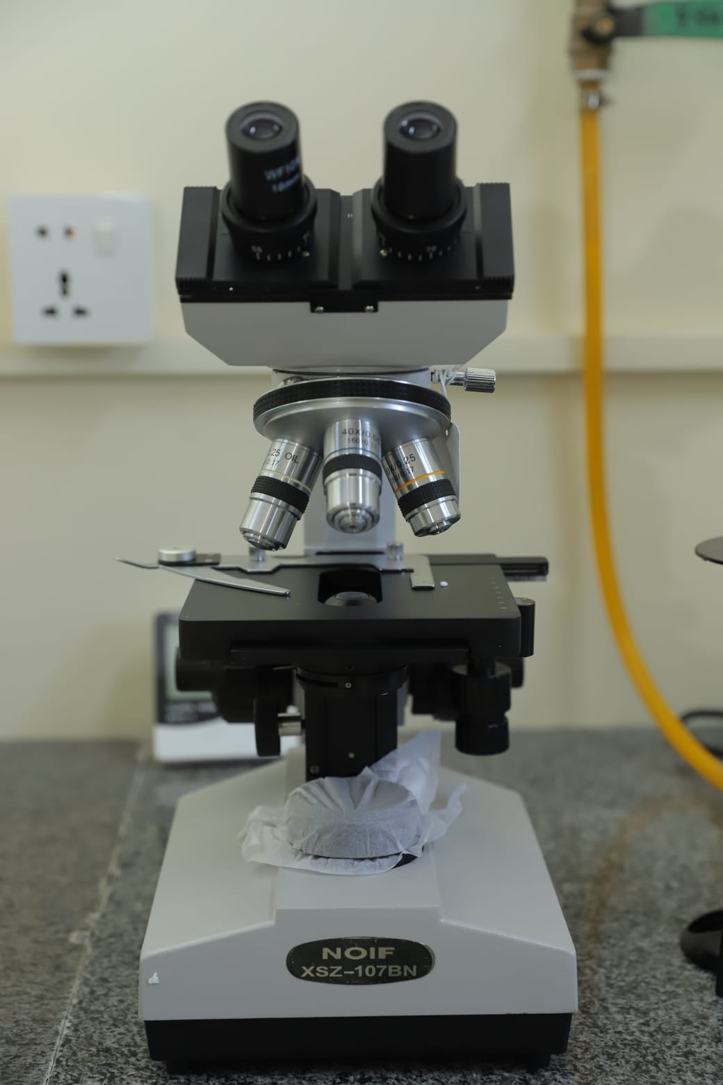campus facilities in KIHS-Compound microscope setup in science lab for student use